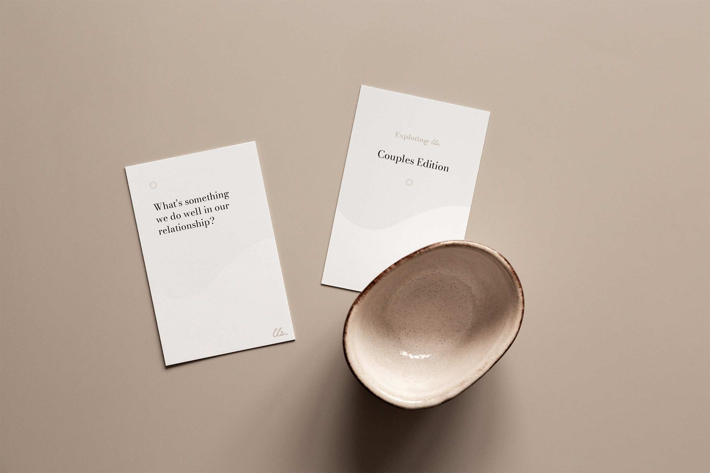 Exploring Us Couples Edition conversation cards packaging showing all-white box with subtle question text for relationship conversations