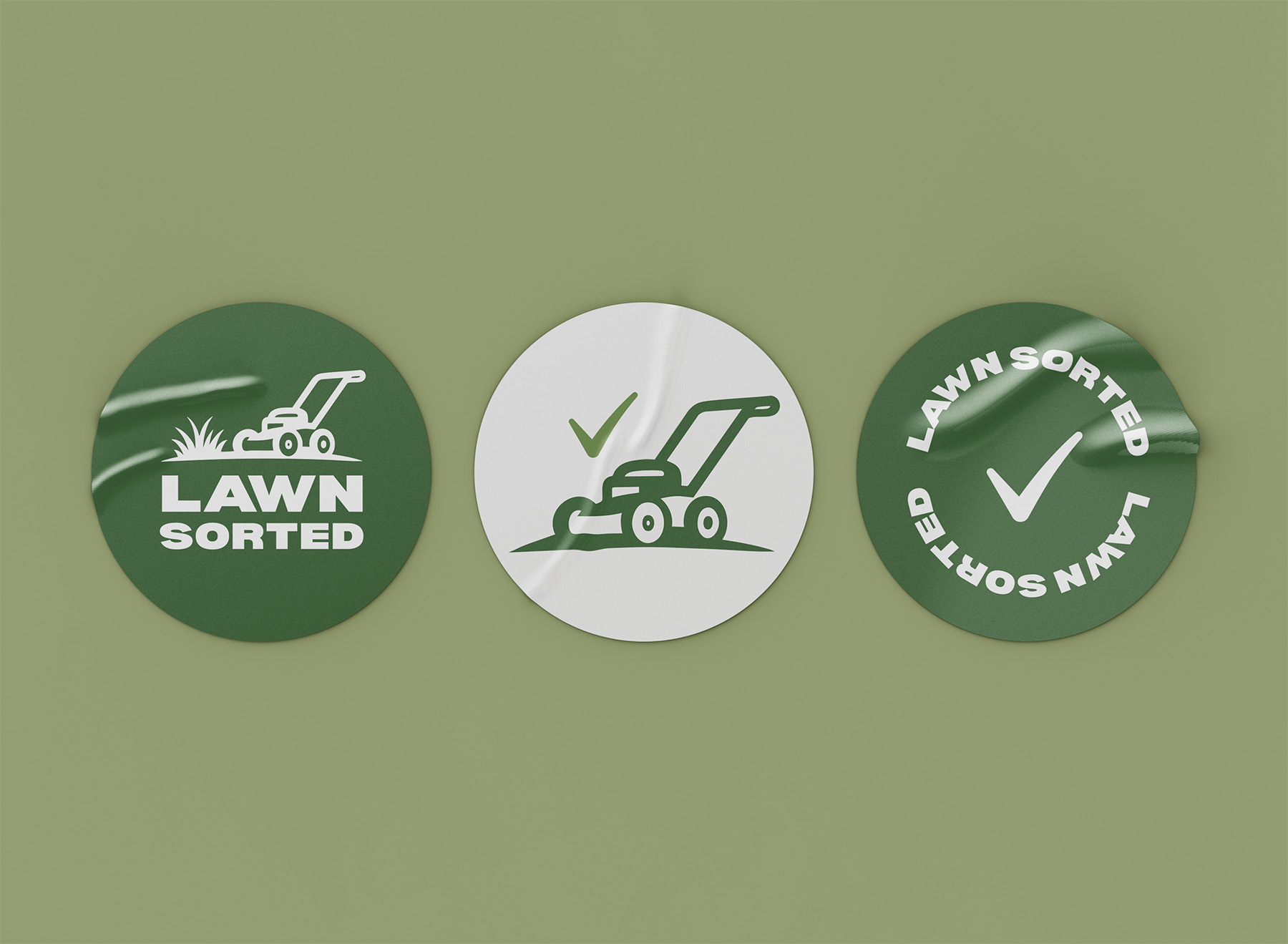 Lawn Sorted circular branded stickers showing logo variations and mower icon designs for customer touchpoints